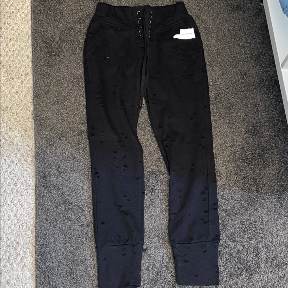 Ripped black sweatpant/ jogger